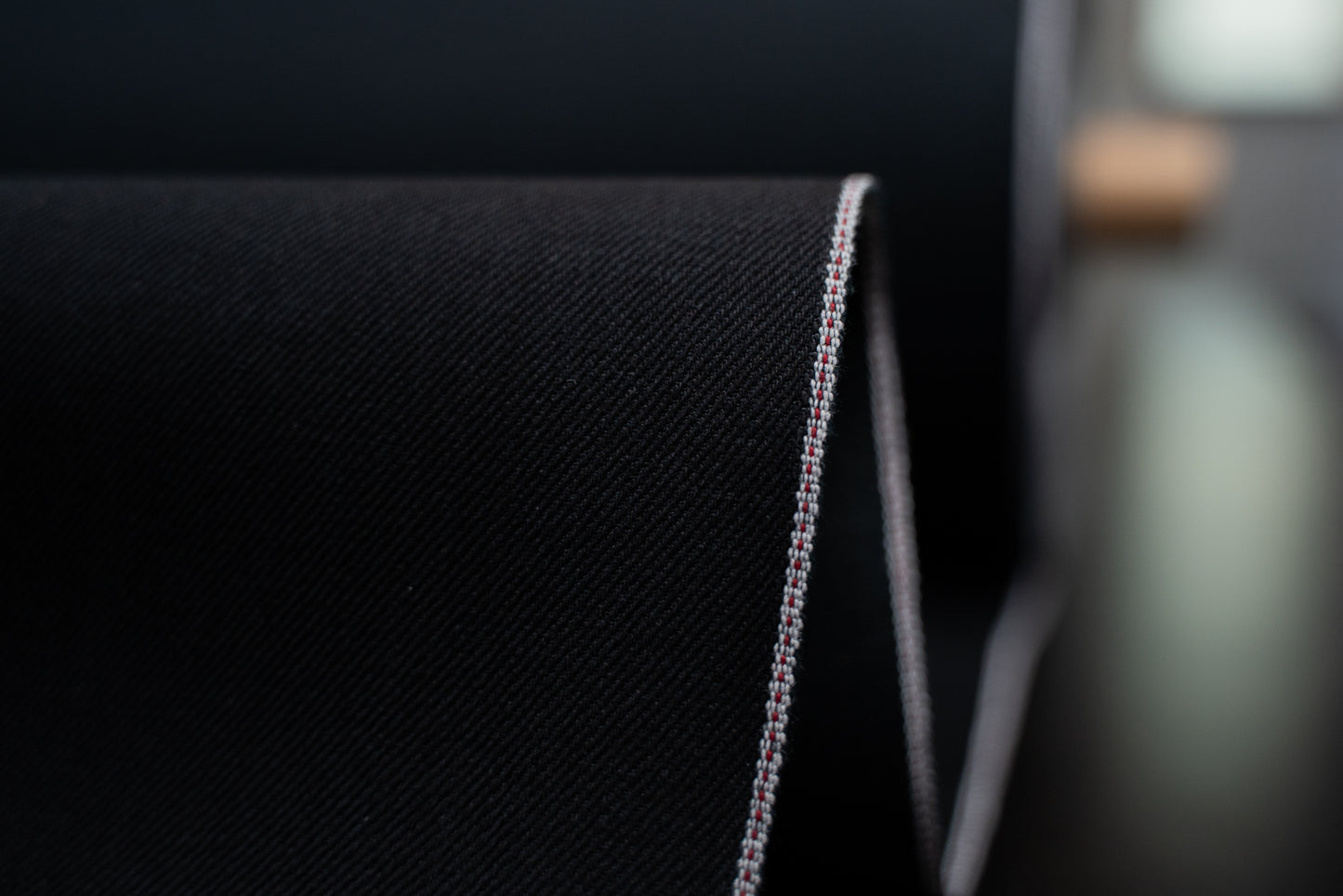 S-062 - 11 oz - elastic black selvage denim